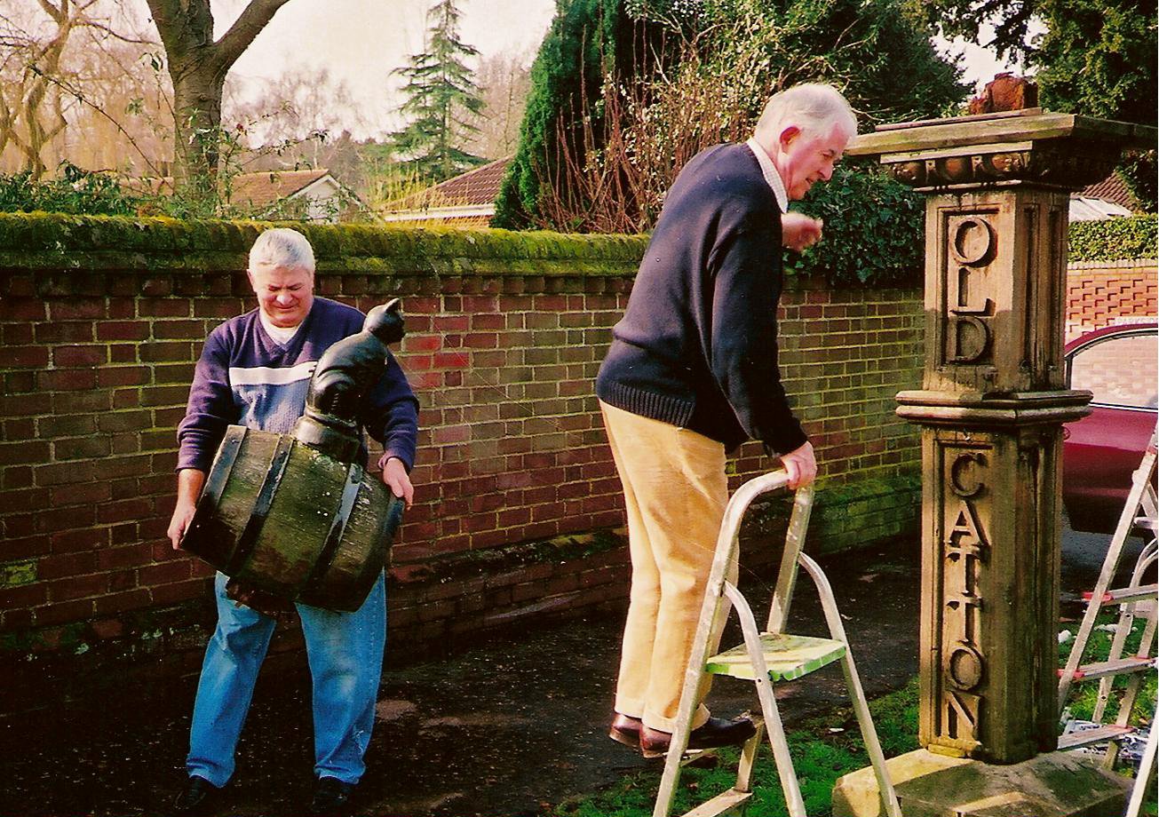 Parish Chairman David Thompson on steps - Melvyn Johnson removes barrel